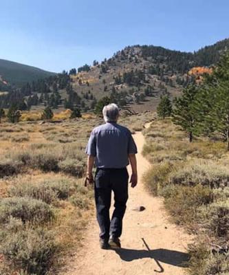 photo of patient hiking outdoors